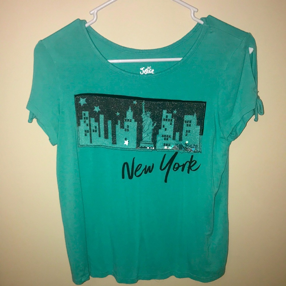 I am selling a justice shirt that has only been worn a few times.